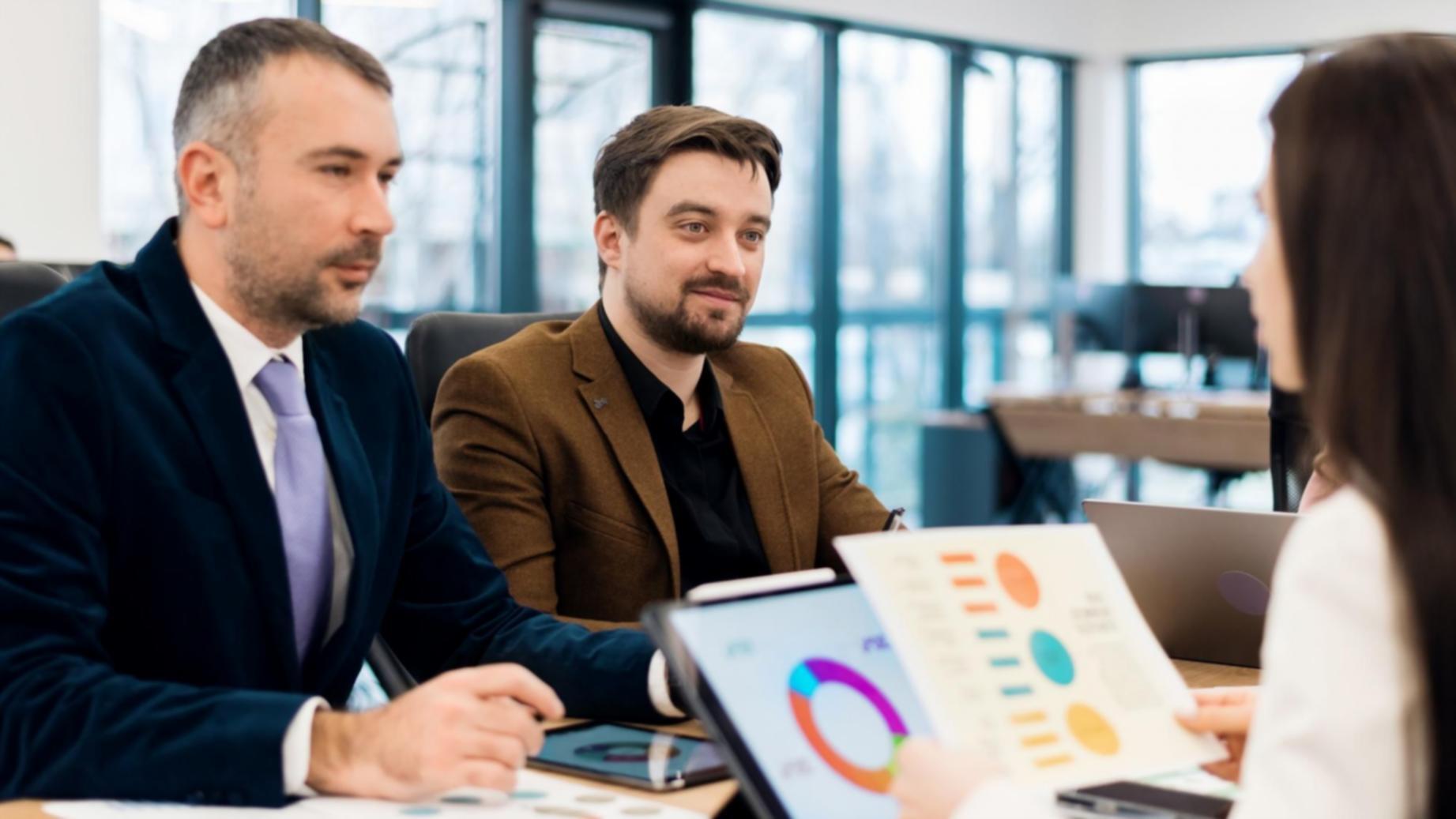 Team discussion session about trading curriculum development